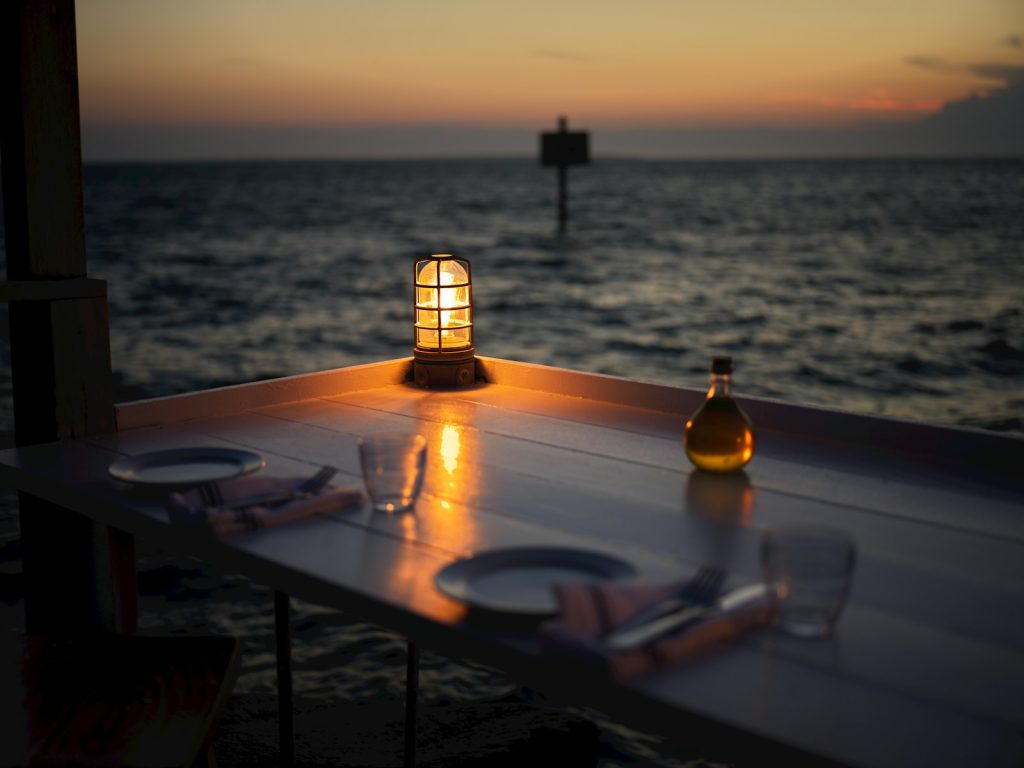 A bottle of beer sitting on top of a table